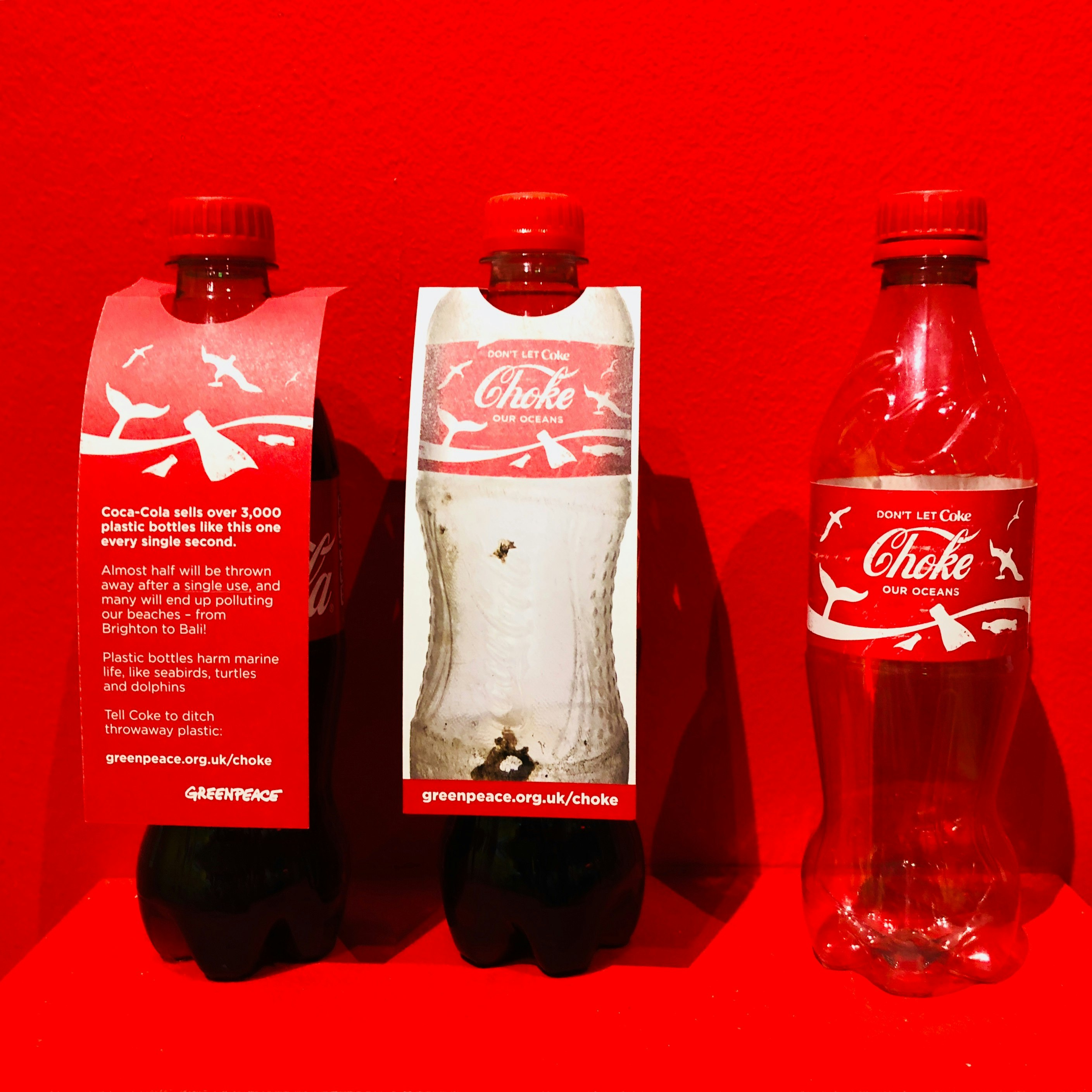 empty Coca-Cola soda bottle